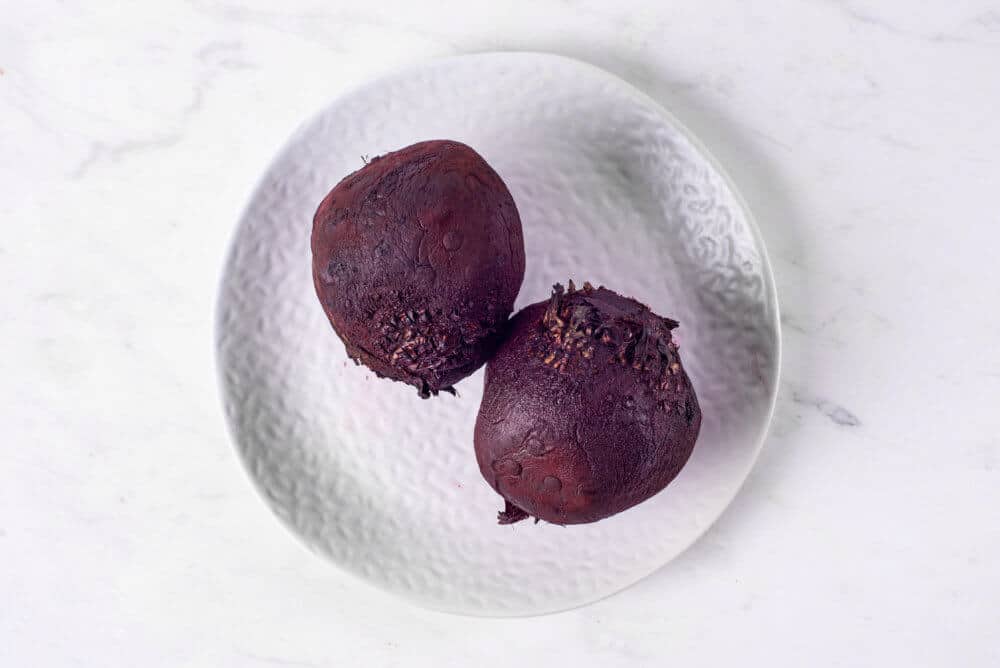 Beets on a white plate.