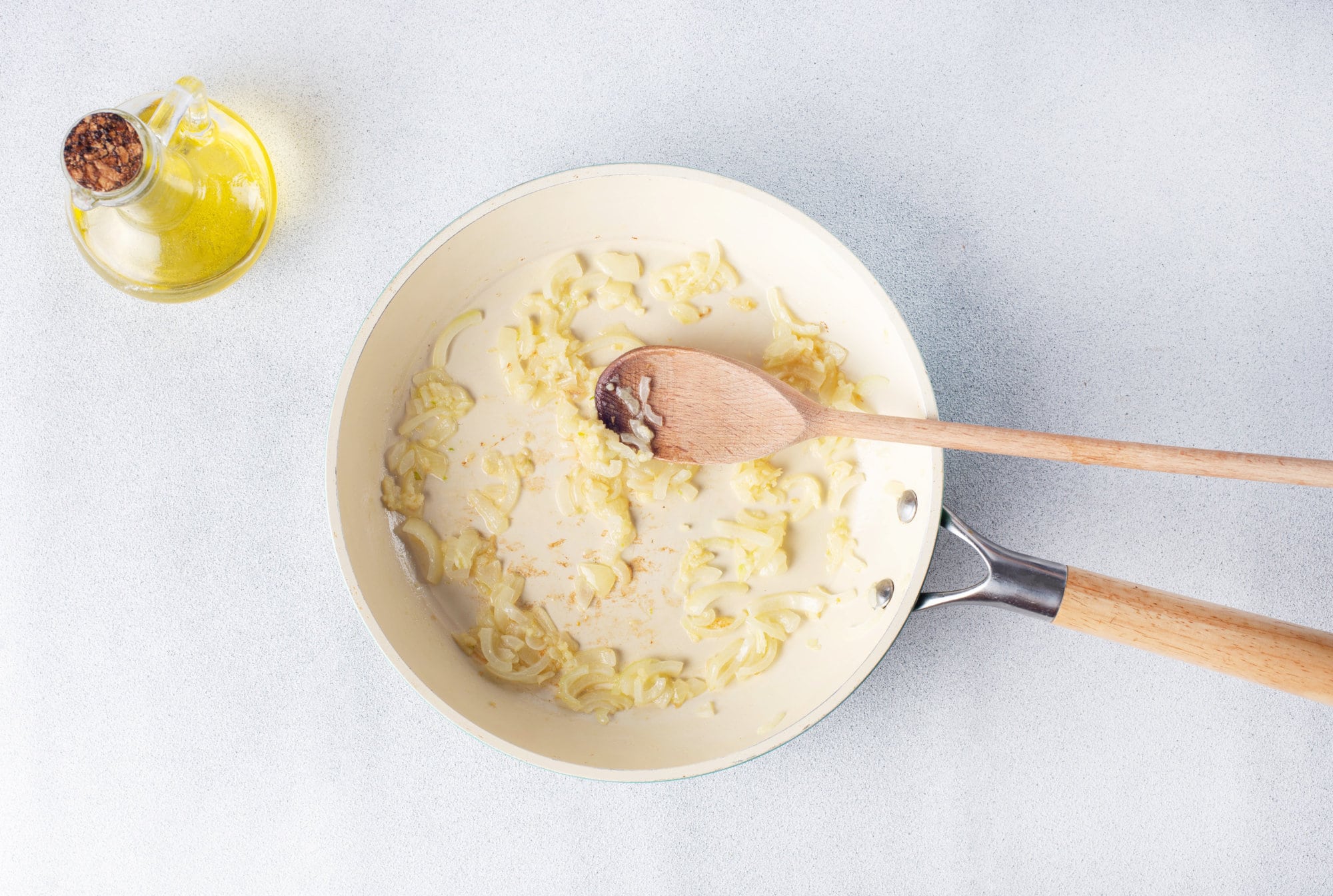 oil with chopped onion in a skillet.