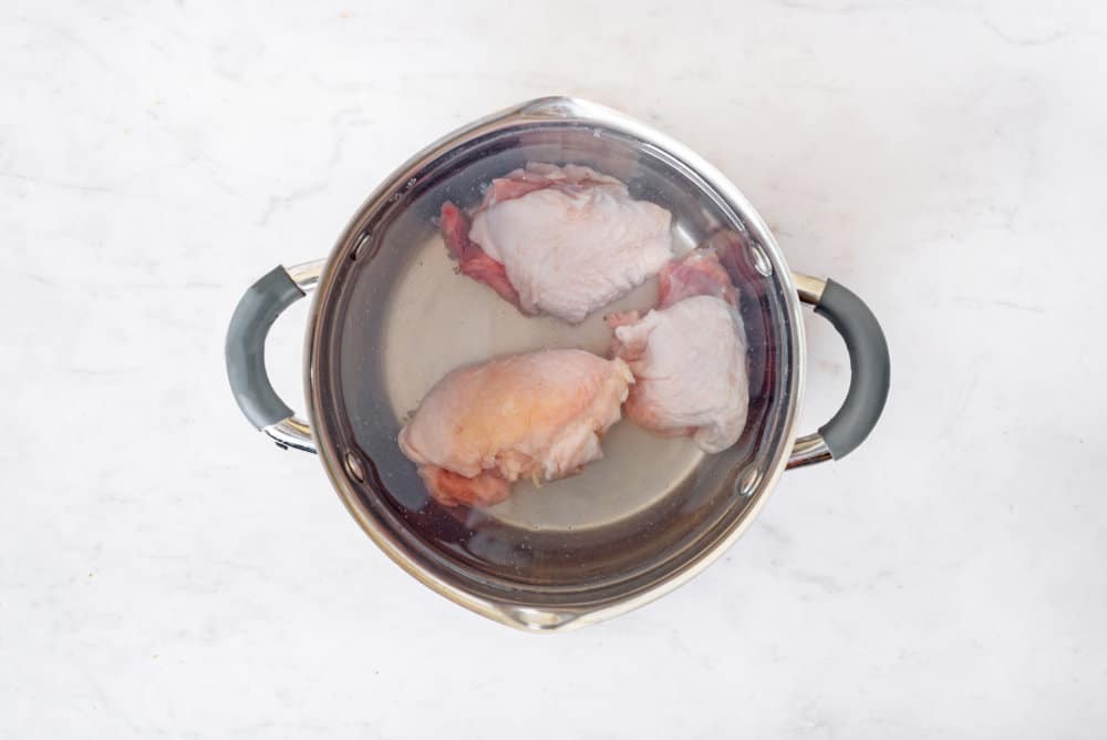 chicken-pieces-in-a-silver-pot-with-water