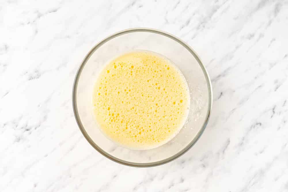 Cake batter in a glass bowl.