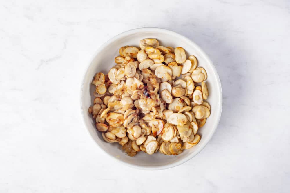 Mushrooms in a white bowl.