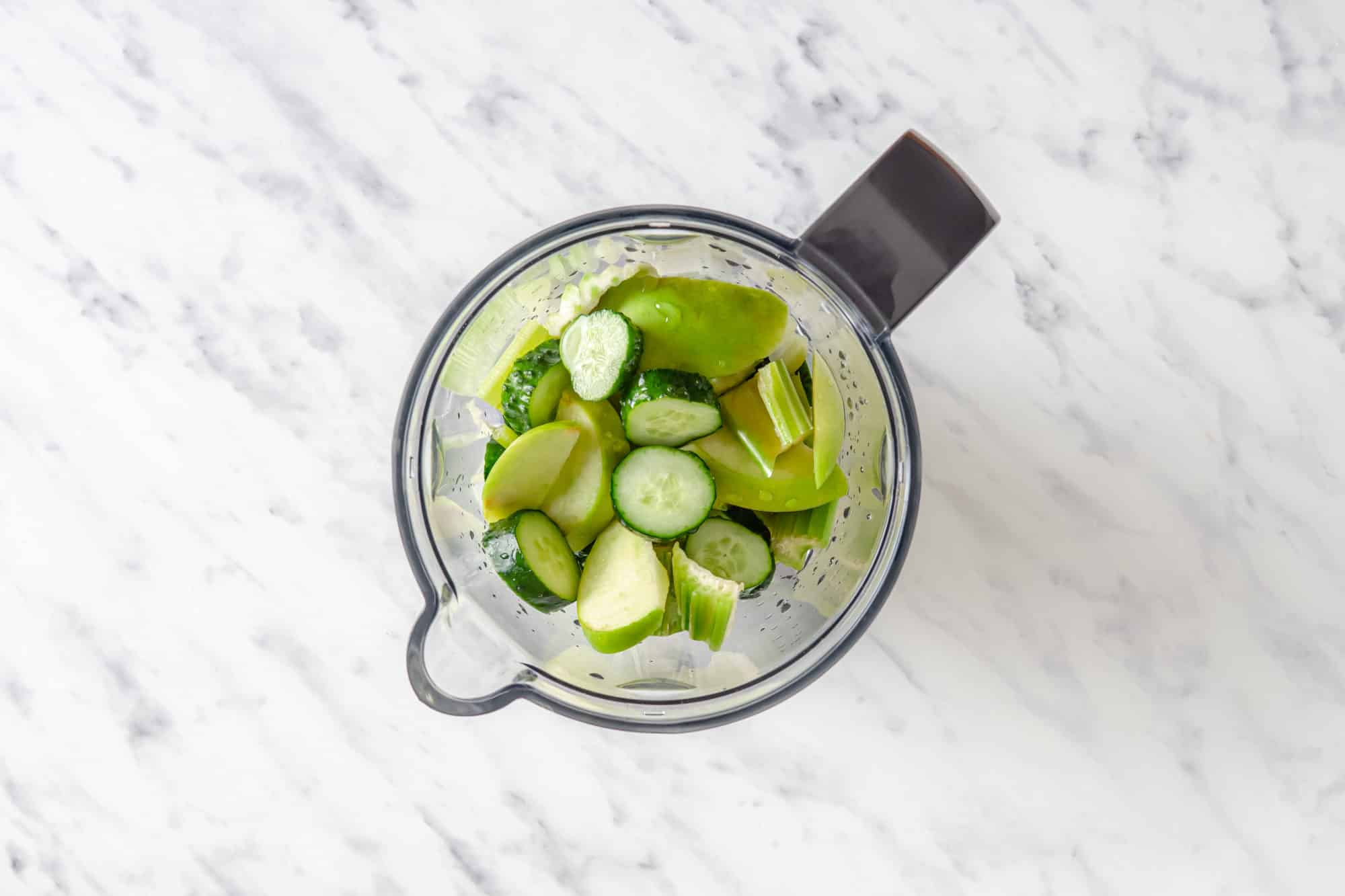 chopped ingredients in a blender.