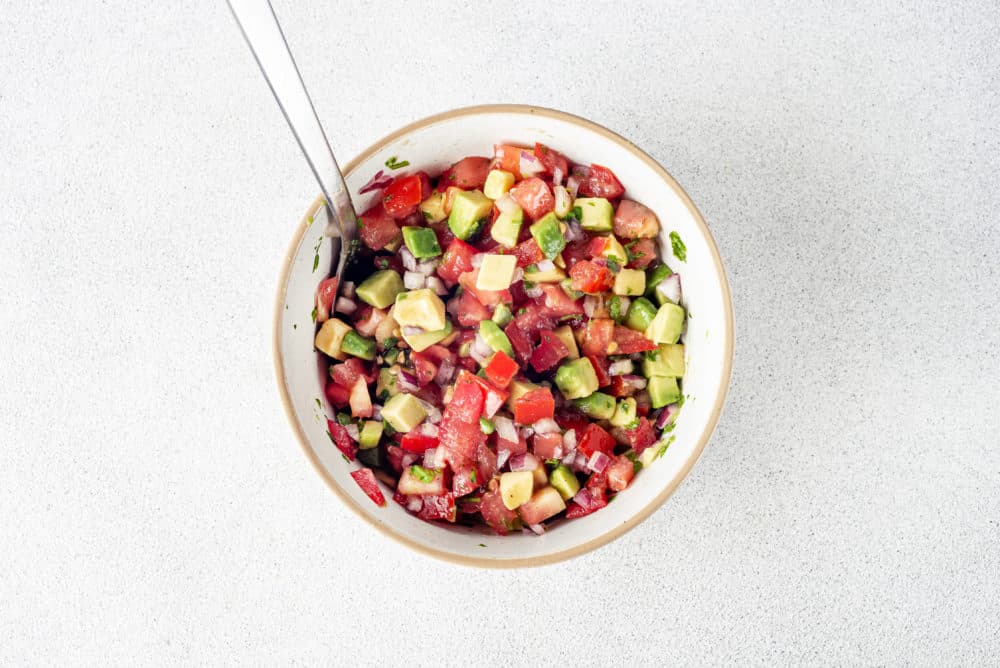 salsa-in-a-white-bowl-with-a-spoon