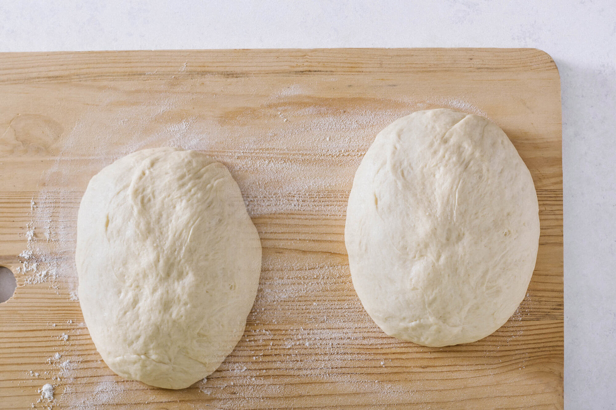 dough-for-walnut-roll-recipe-on-a-wooden-board