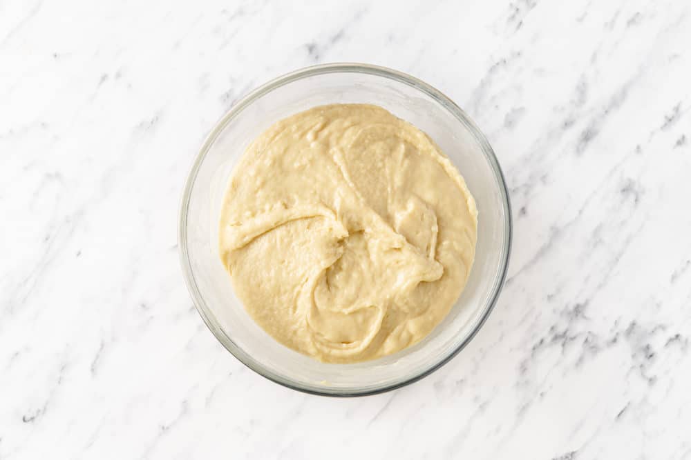 raw dough in a glass bowl.