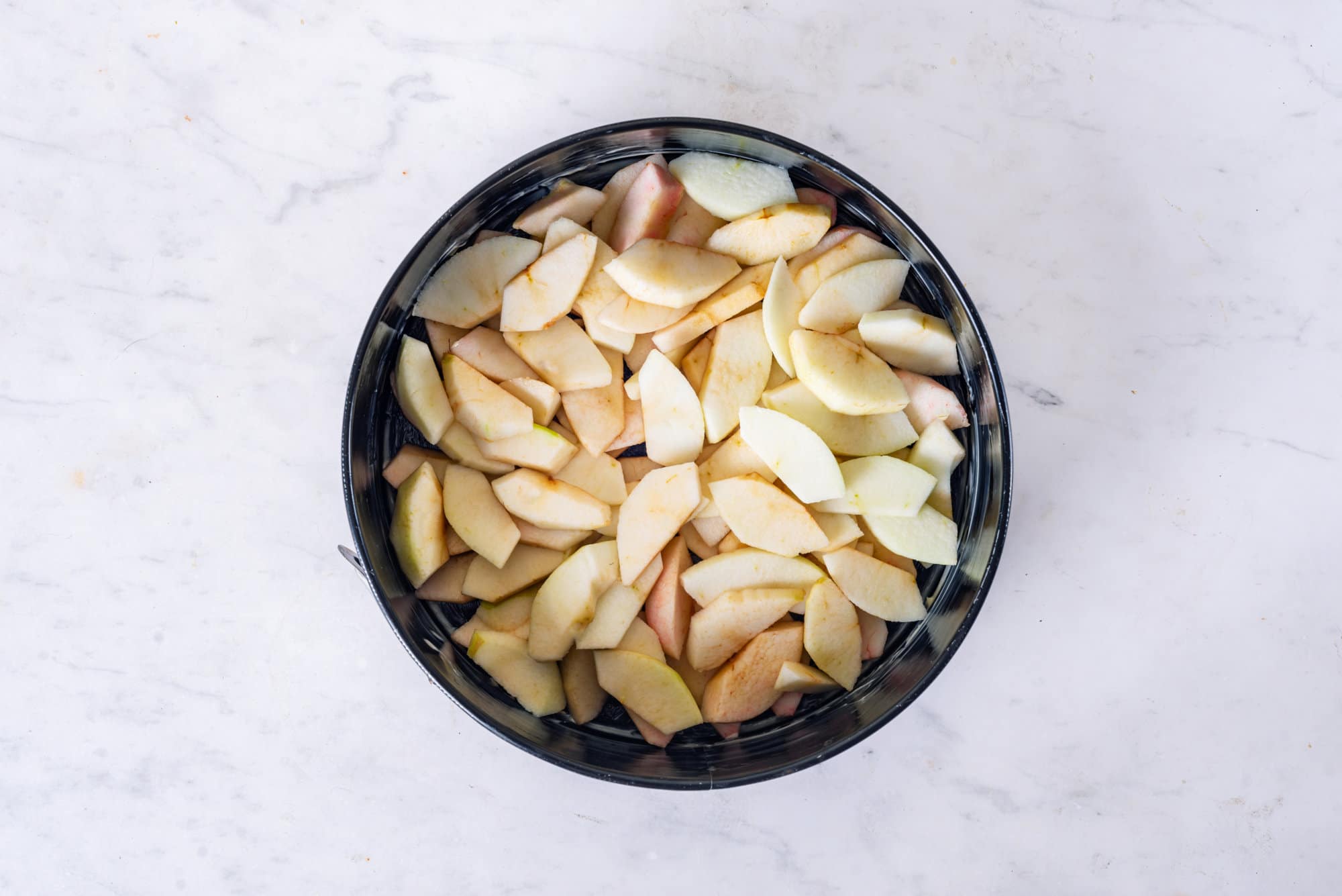 sliced apple in a cake form. 