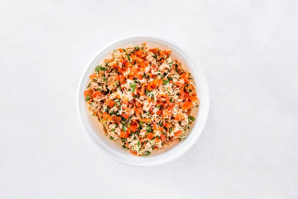 Bruschetta topping in a white bowl.