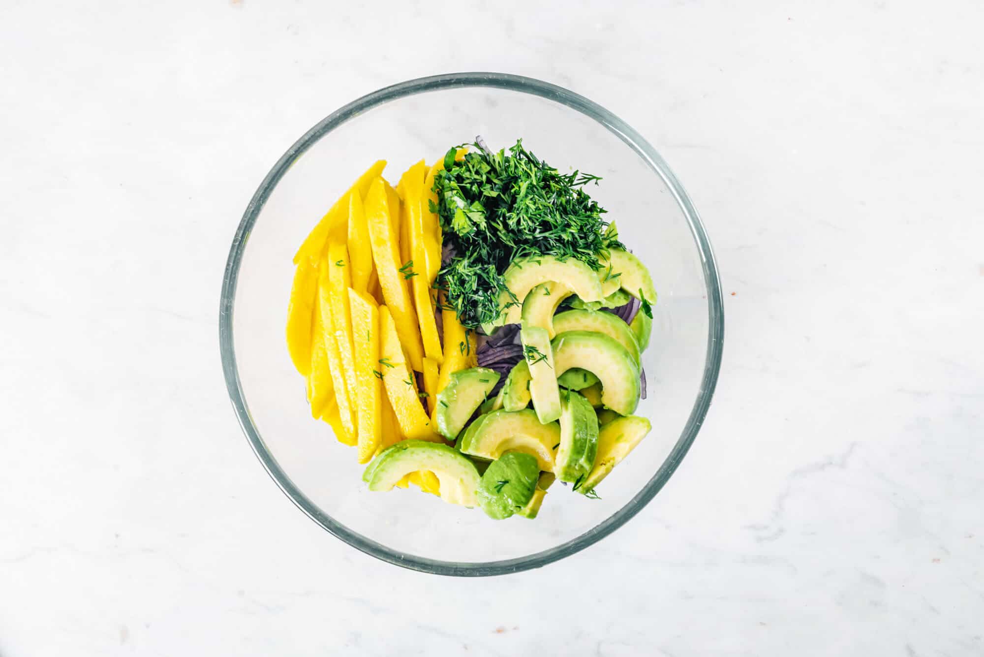 avocado-chicken-salad-ingredients-in-a-glass-bowl