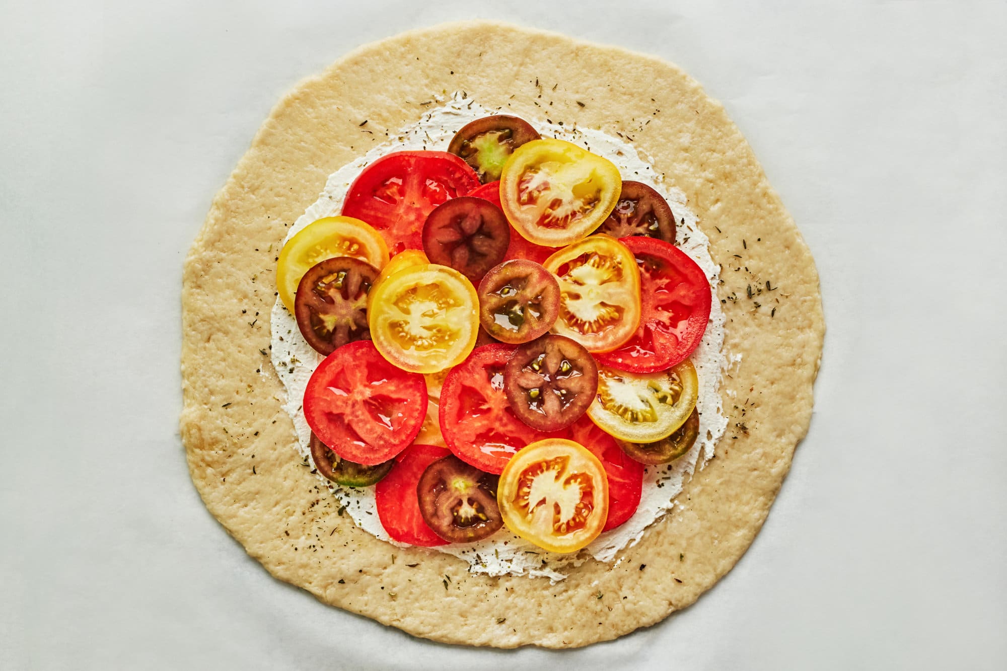 dough cream cheese seasonings and tomatoes.