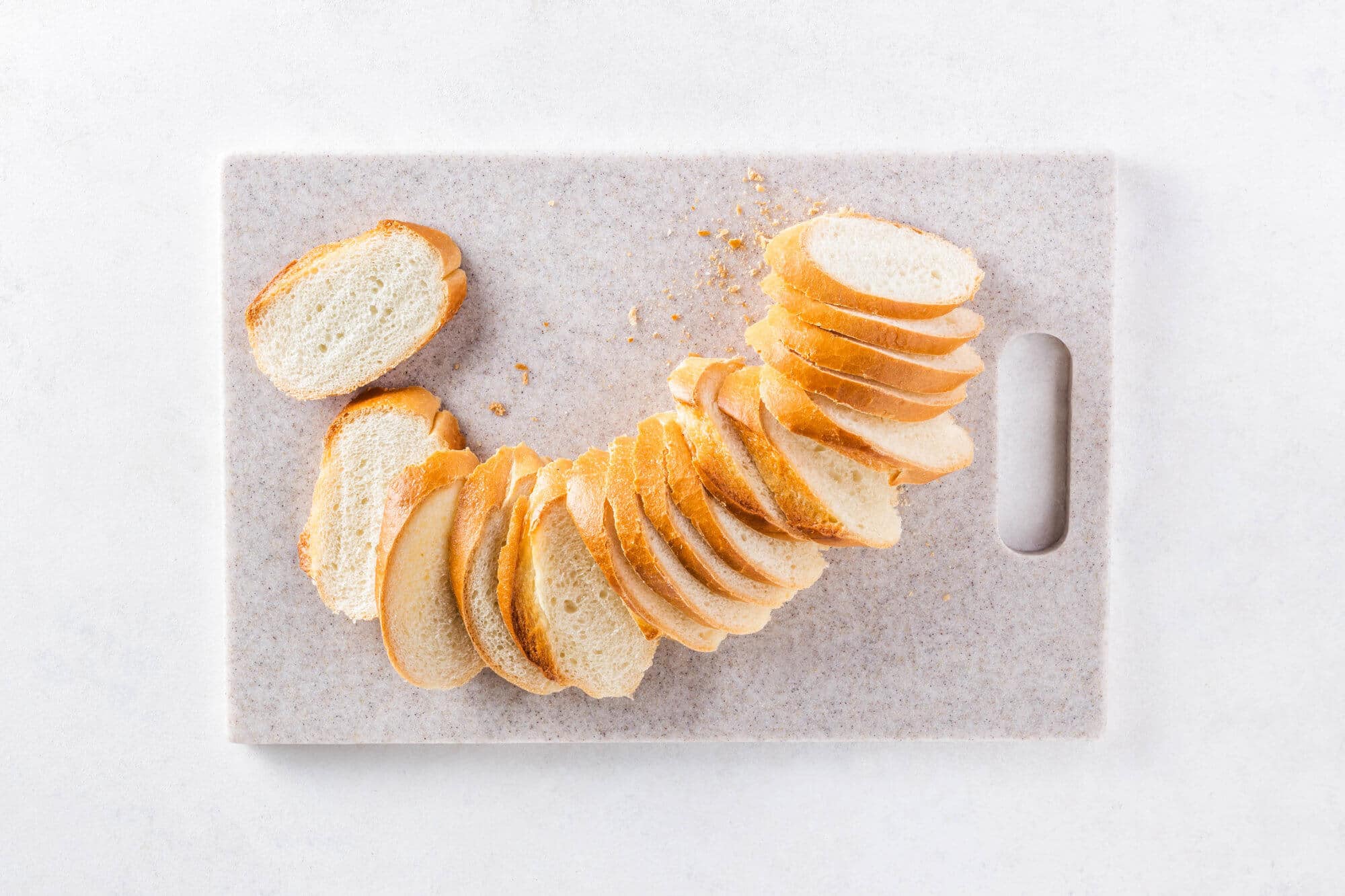 Sliced bread on a cutting board.