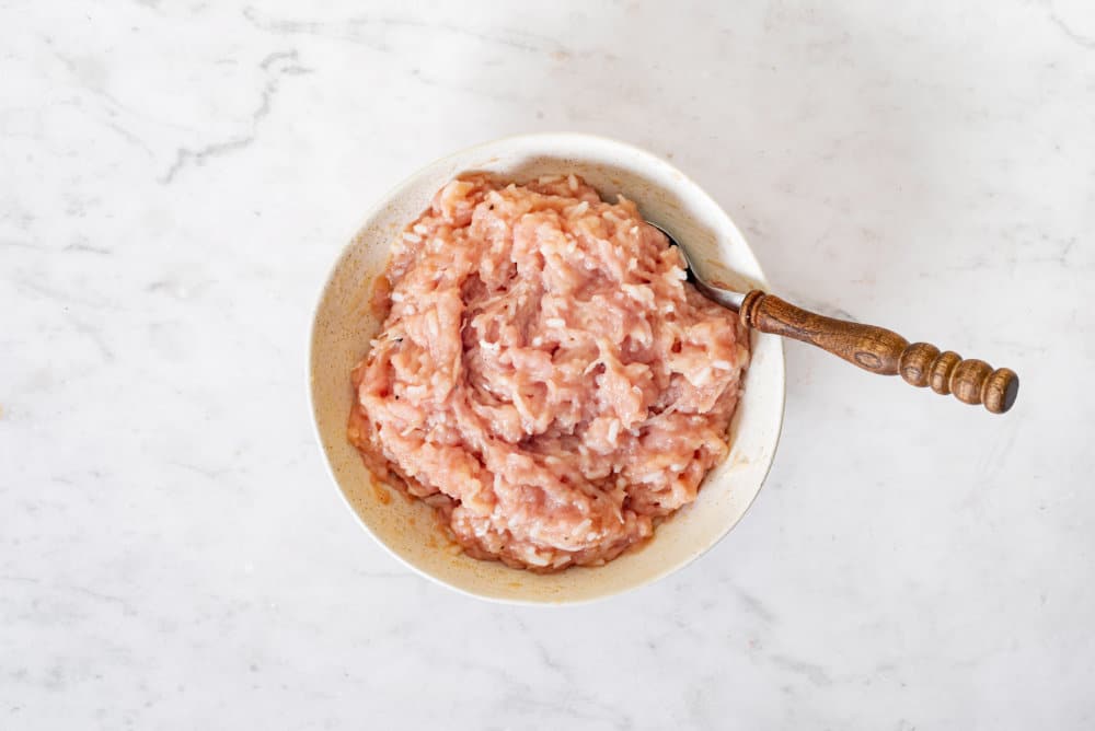 ground-meat-in-a-bowl-with-a-spoon