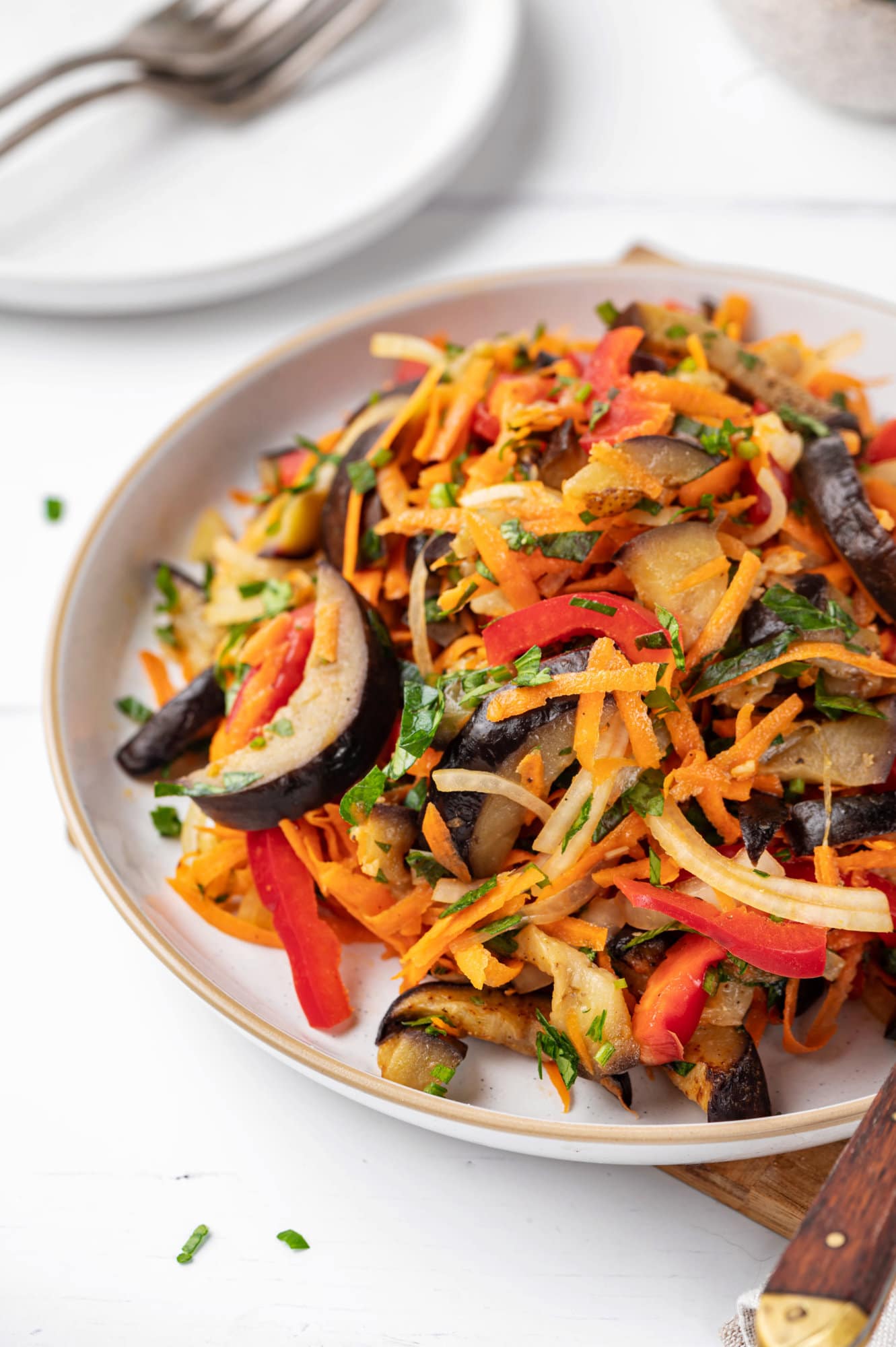 eggplant-salad-on-white-plate