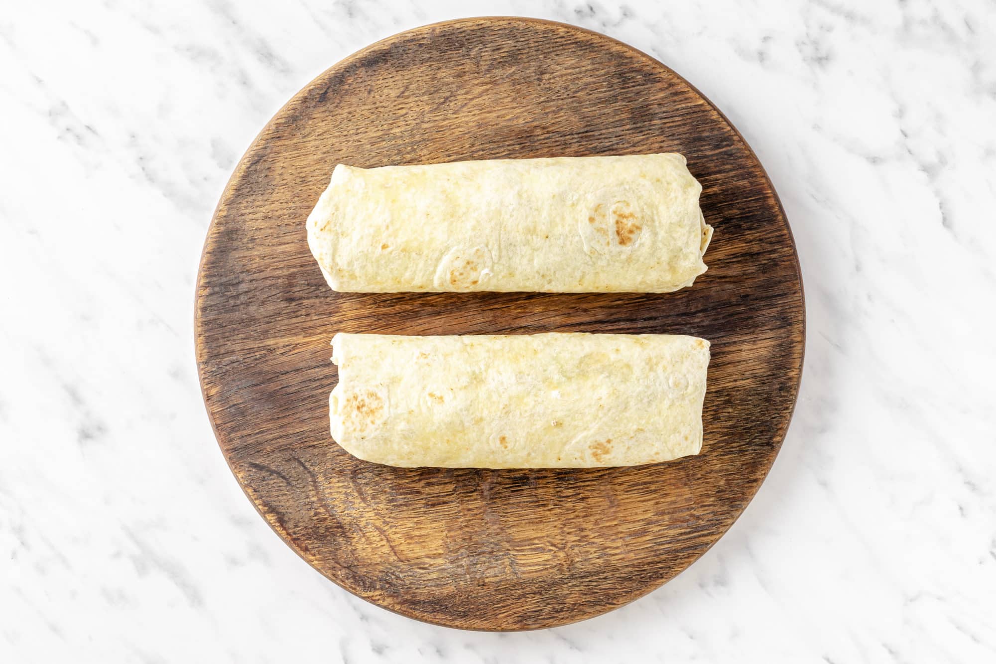 two wrapped burritos.