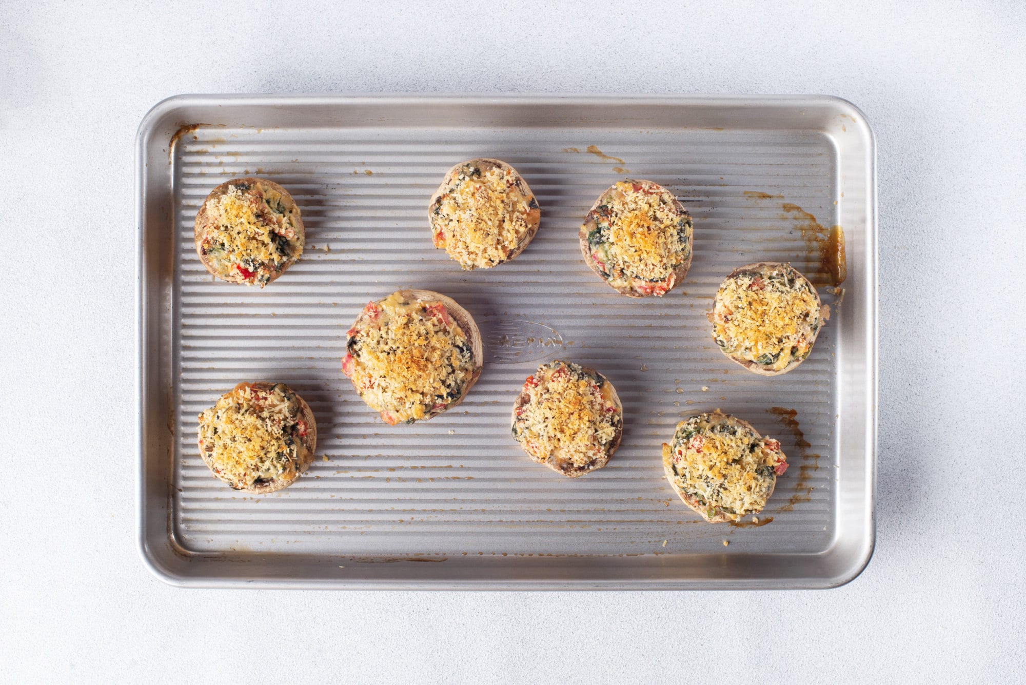 stuffed-mushroom-bites-on-baking-tray baked.