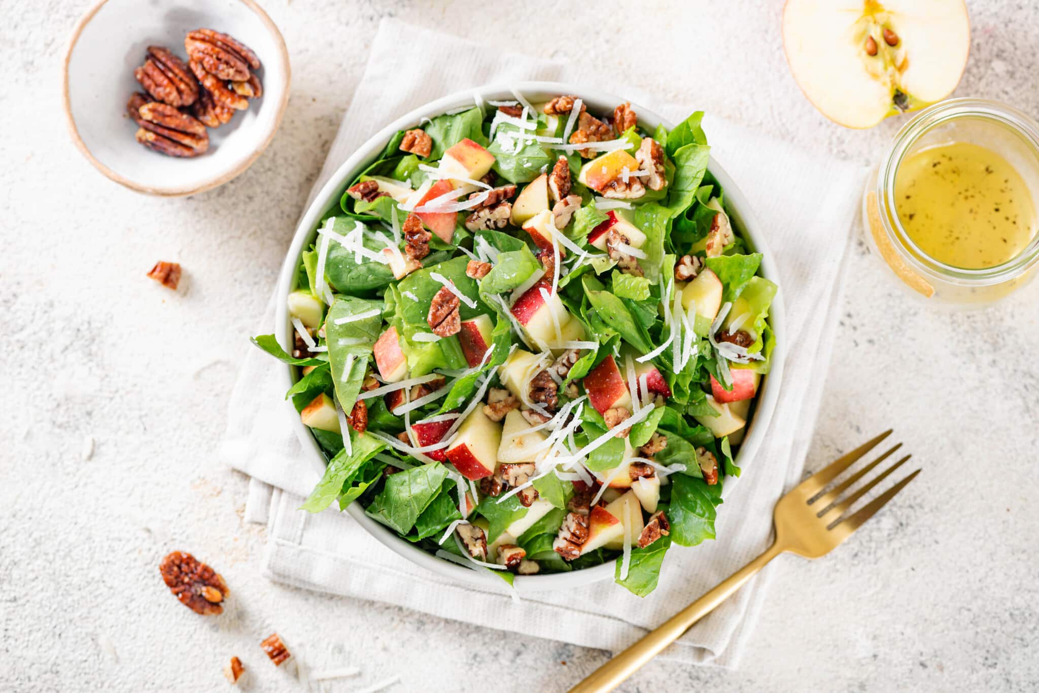 apple salad in a bowl on a folded towel.