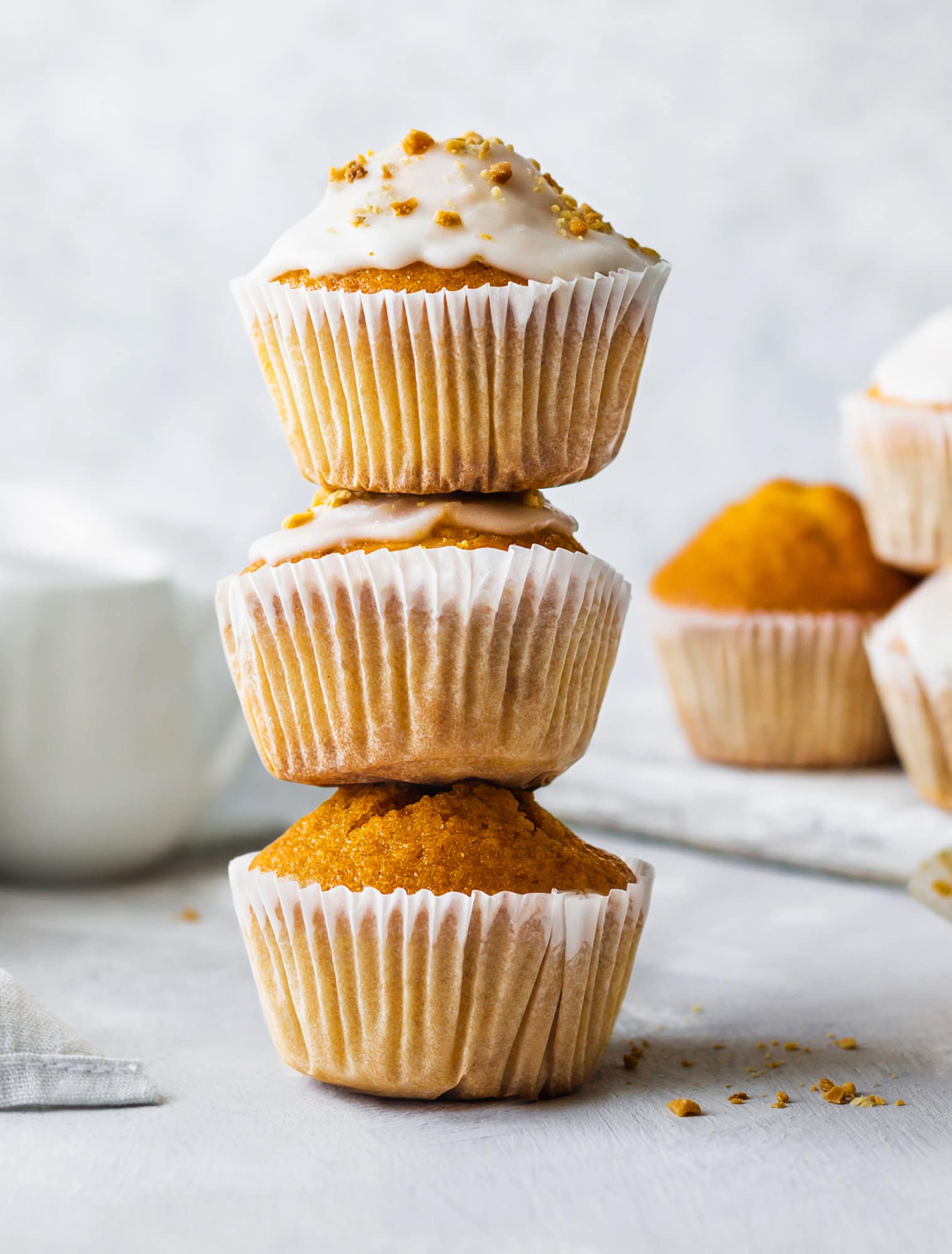 Stacked pumpkin muffins.