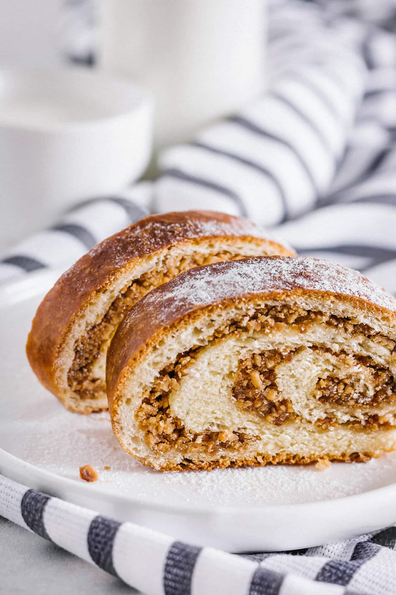 russian-walnut-roll-on-white-plate-with-striped-towel