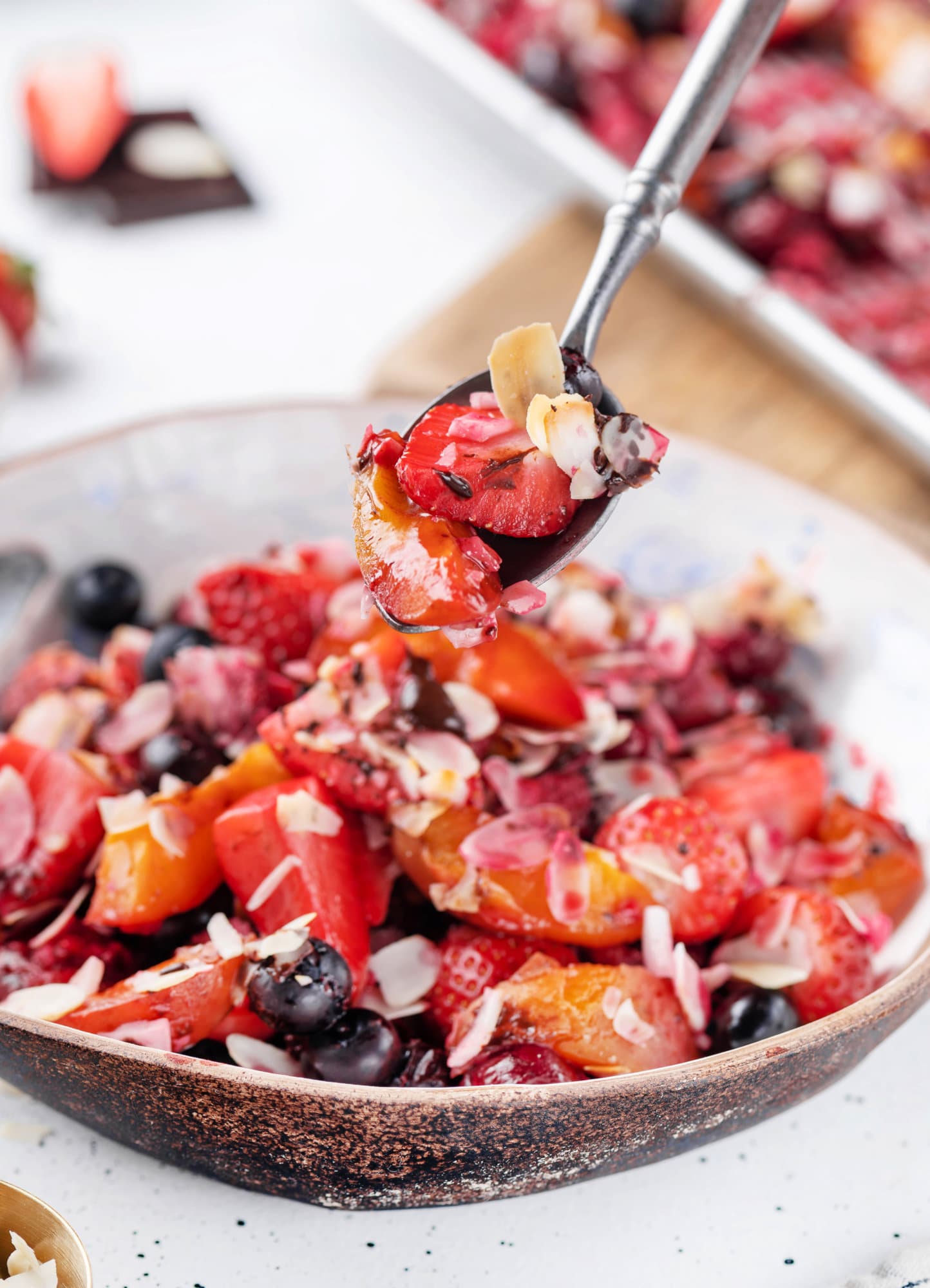 warm-fruit-salad-in-a-bowl-with-a-spoon