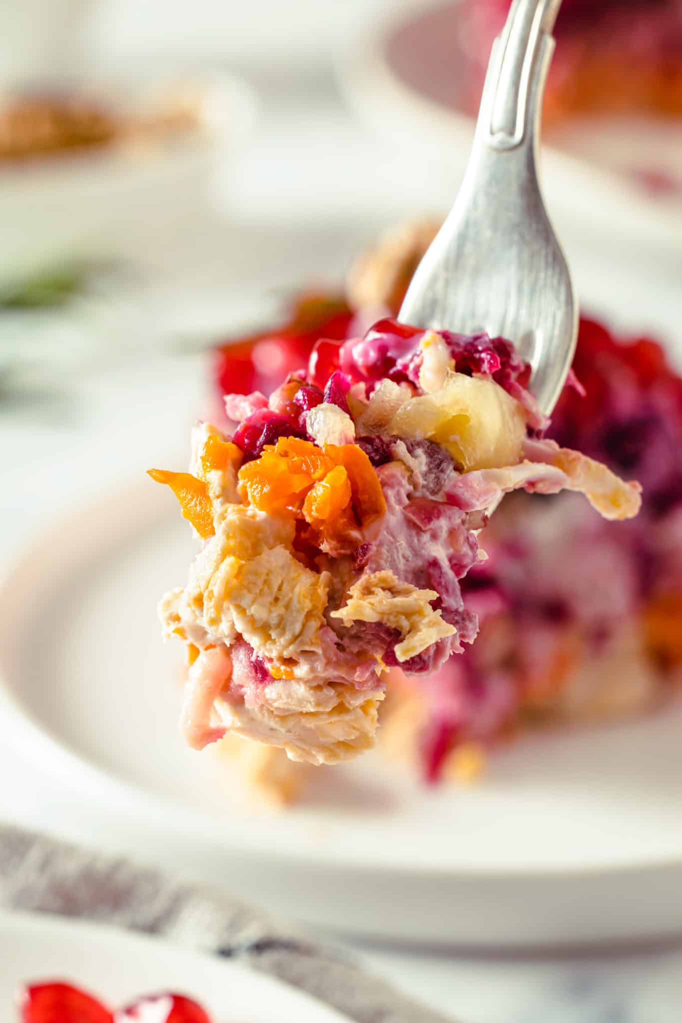 a forkful of the pomegranate chicken salad.