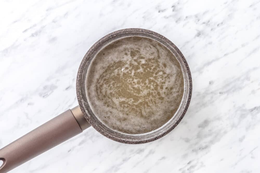 Agar-agar and water mixture boiled in a saucepan.