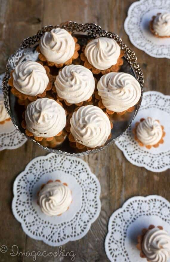 meringue-jam-filled-tartlets-on-a-cake-stand-and-some-on-doilies