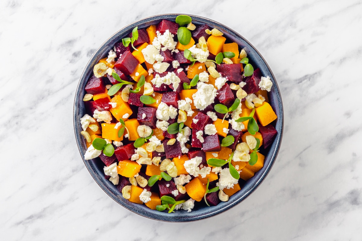 beet salad in a bowl with goat cheese