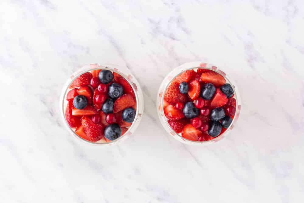 glass cups with berries on top.