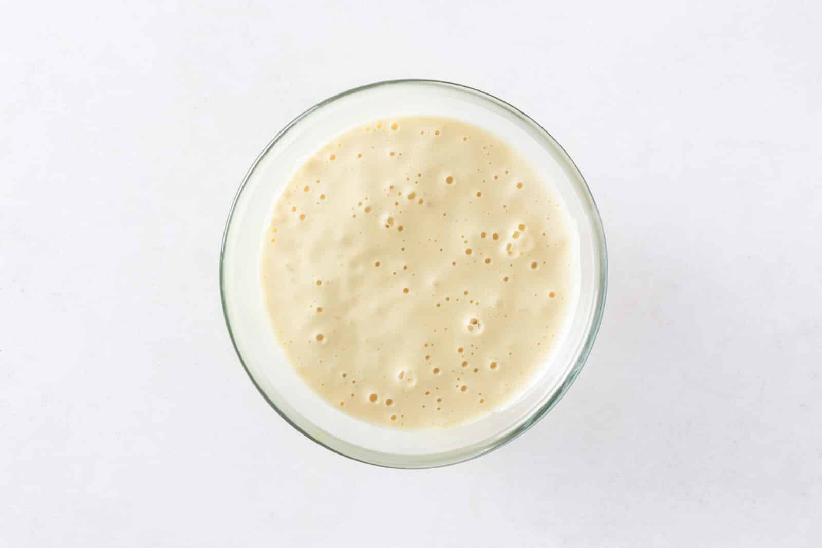 Cake batter in a glass bowl.