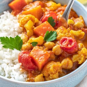 easy cauliflower and chickpea curry over a bed of rice.