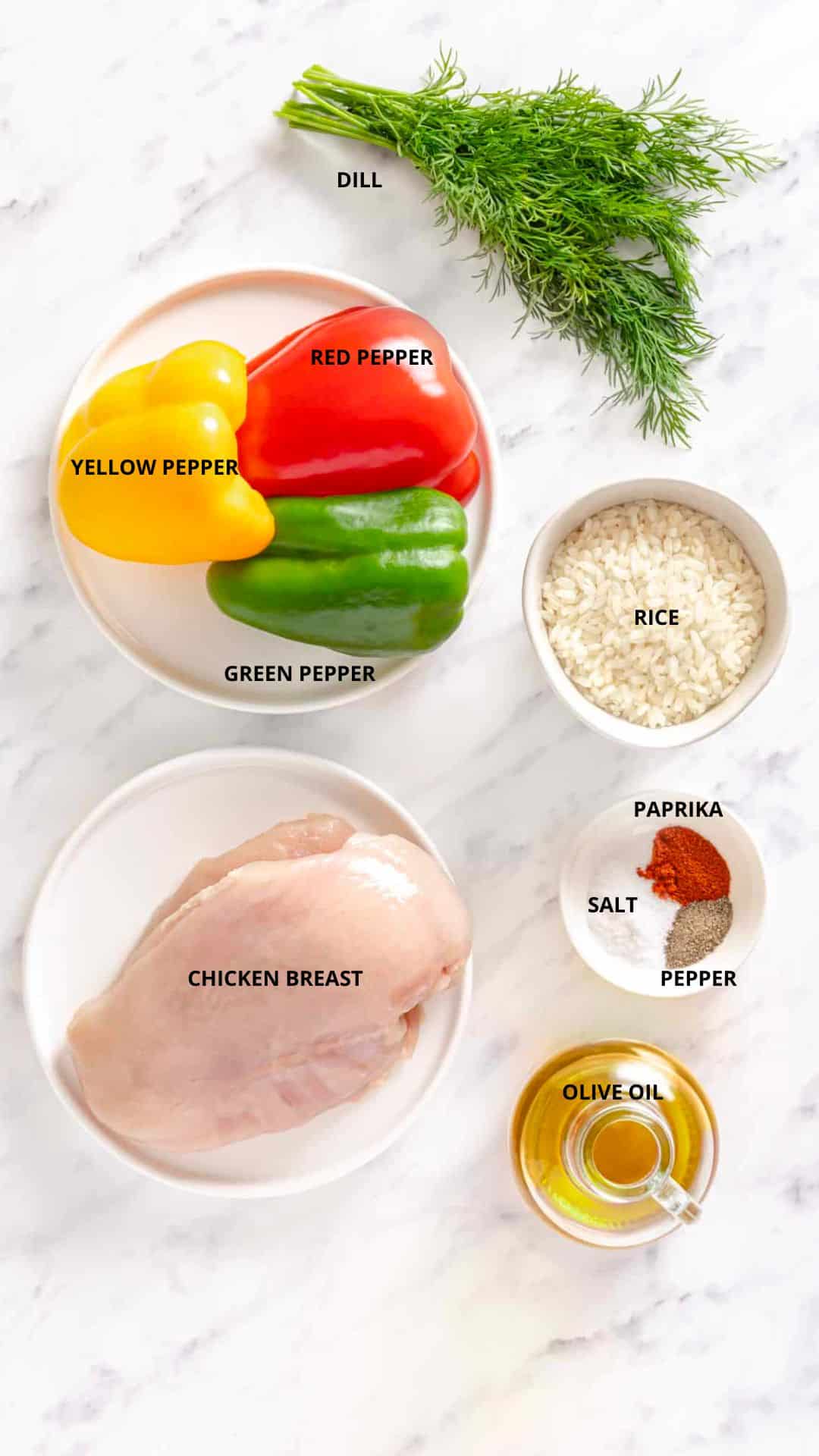 Chicken and bell peppers rice bowl ingredients- dill, red pepper, yellow pepper, green pepper, rice, paprika, salt, pepper, chicken breast, and olive oil.