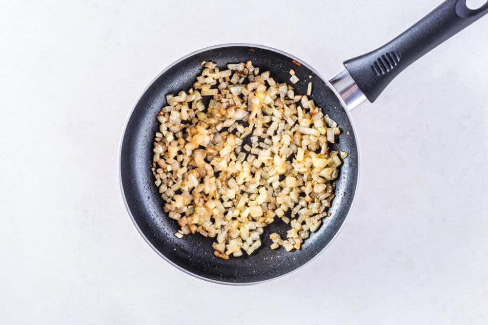 sautéd onions in a pan.