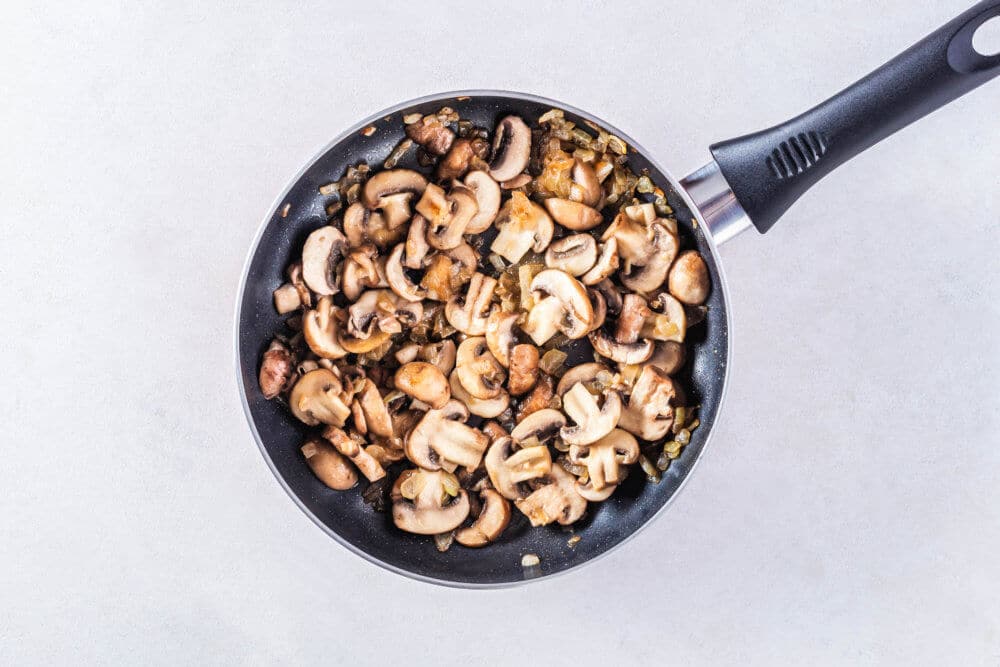 mushrooms in a black pan.