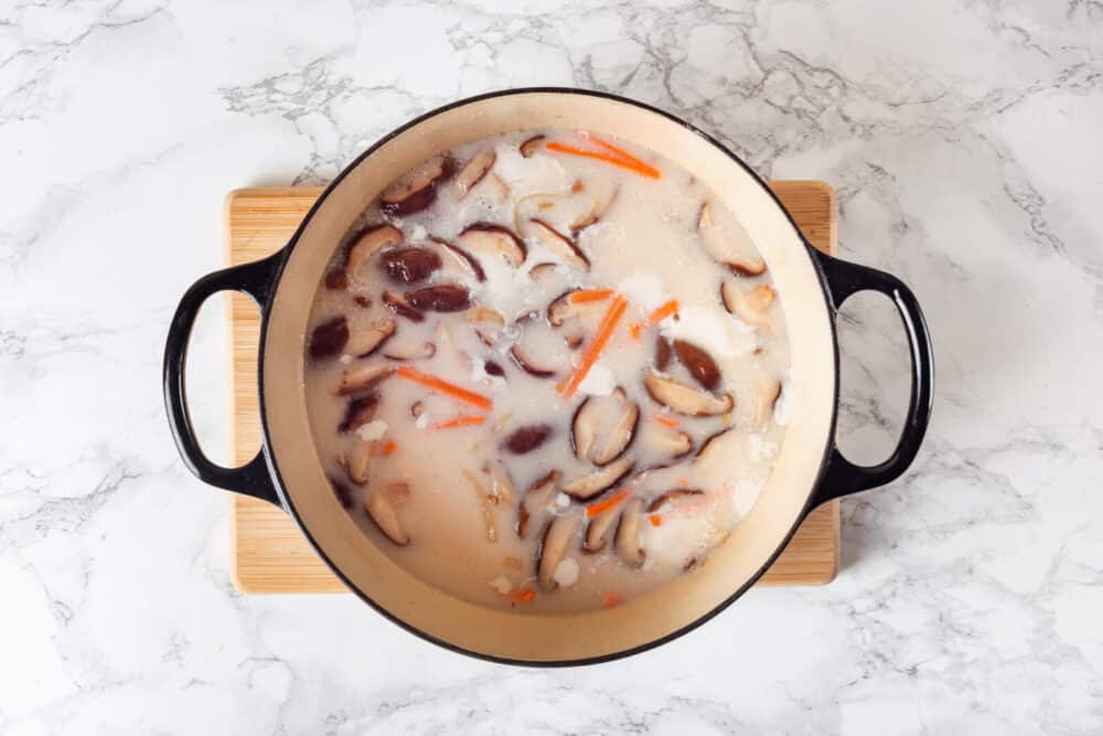 Coconut mushroom soup with coconut milk and vegetable broth.