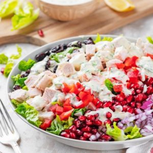 turkey-salad-recipe-on-a-white-plate-with-a-silver-fork