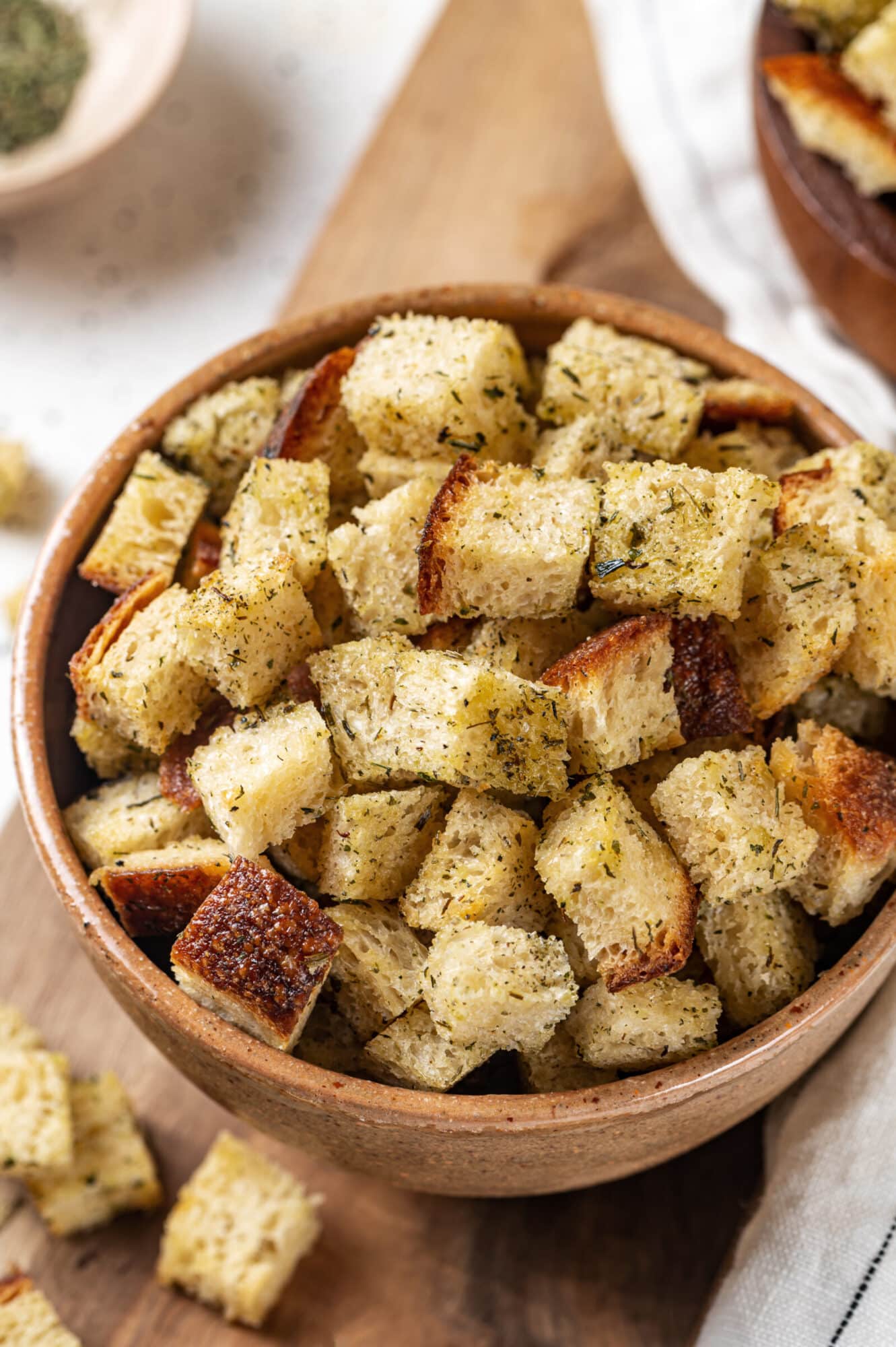 Croutons in a wooden bowl ready to serve with soup.