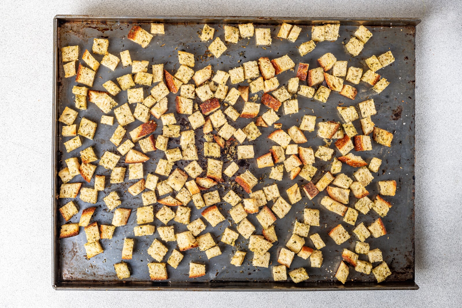 Croutons fresh baked on a baking sheet.