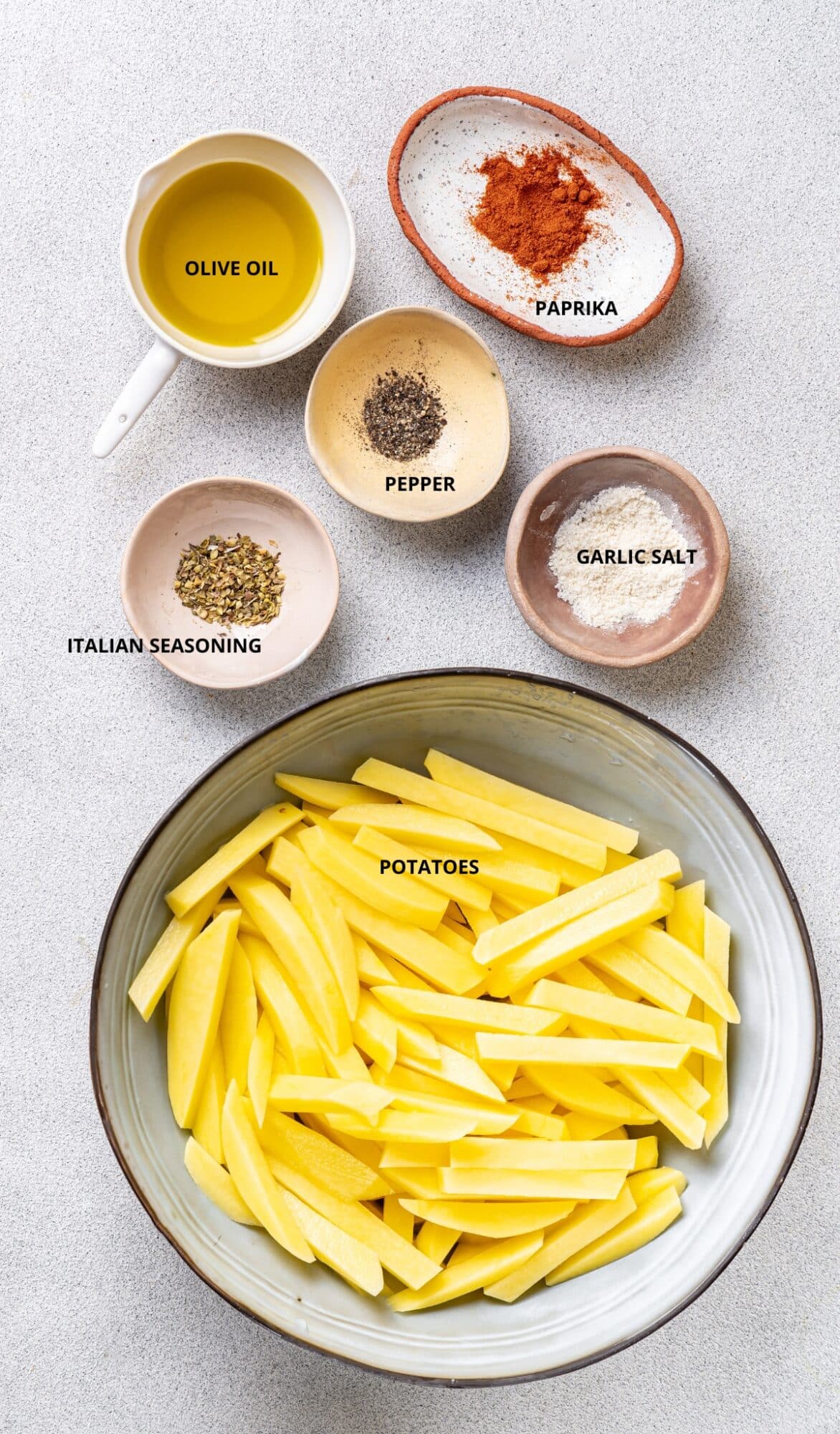 French Fries ingredients- potatoes, pepper, garlic salt, paprika, olive oil, and Italian seasoning.