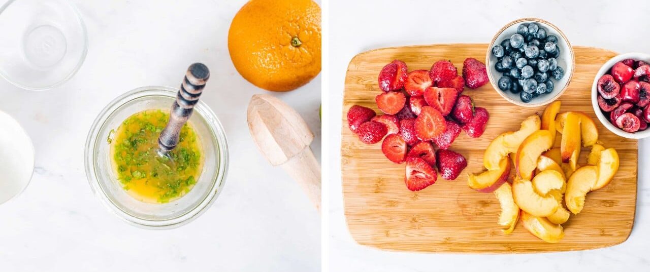 A small bowl of summer fruit dressing and a cutting board with sliced fruit for the salad. 