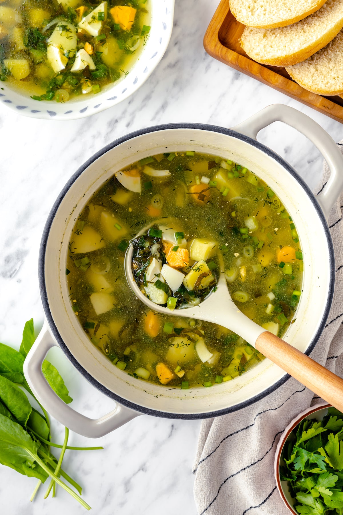 Green Sorrel Soup with ladle