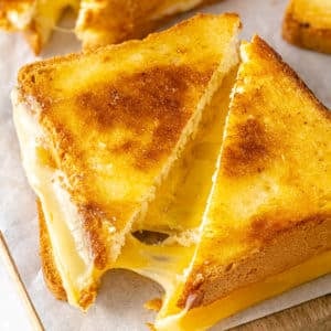 prepared grilled cheese sandwich sliced diagonally.