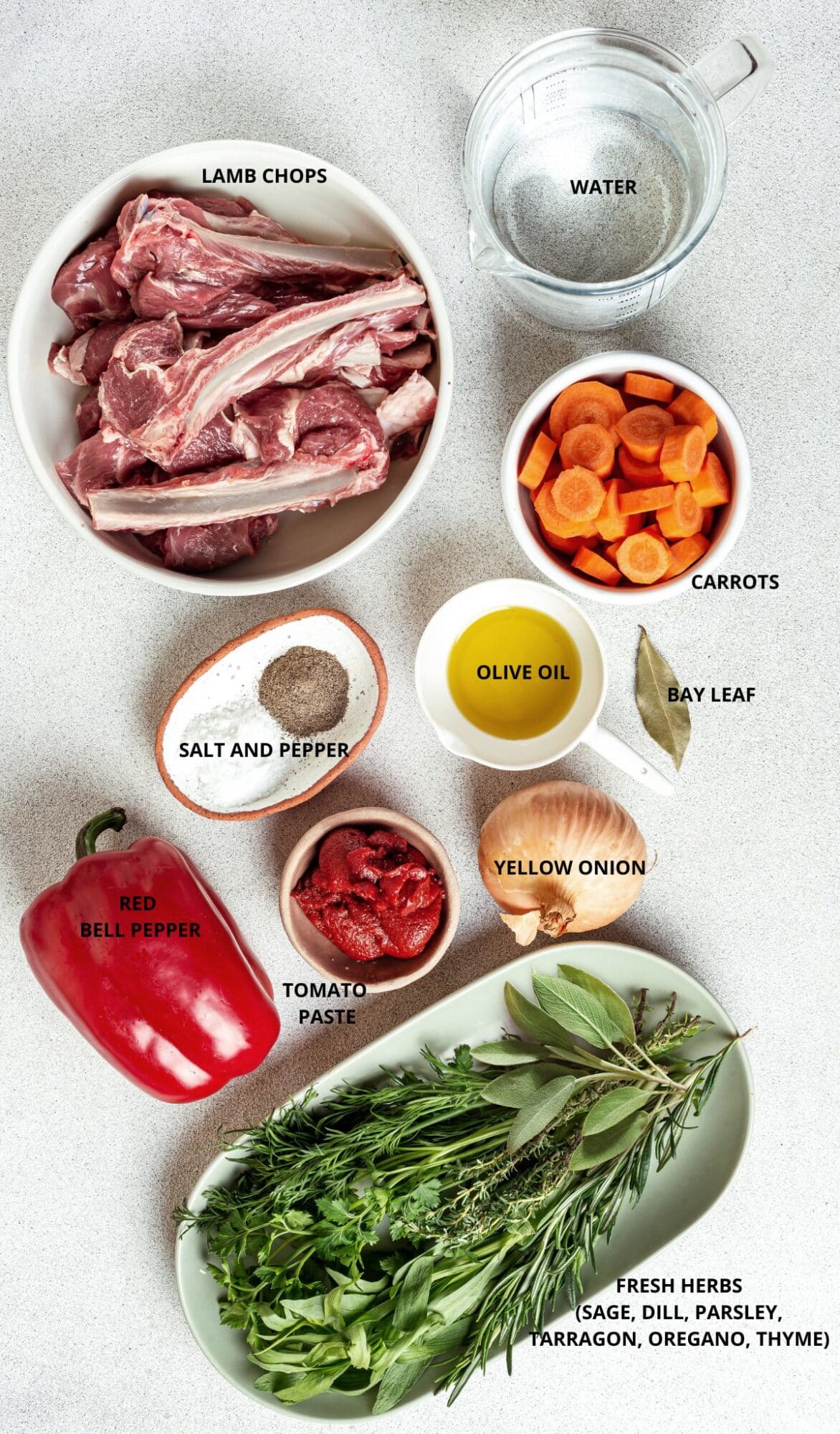 lamb chops in a white bowl water in measuring cup chopped carrots one yellow onion red bell pepper fresh uncut herbs salt and pepper in a dish and tomato paste in a small ceramic dish.