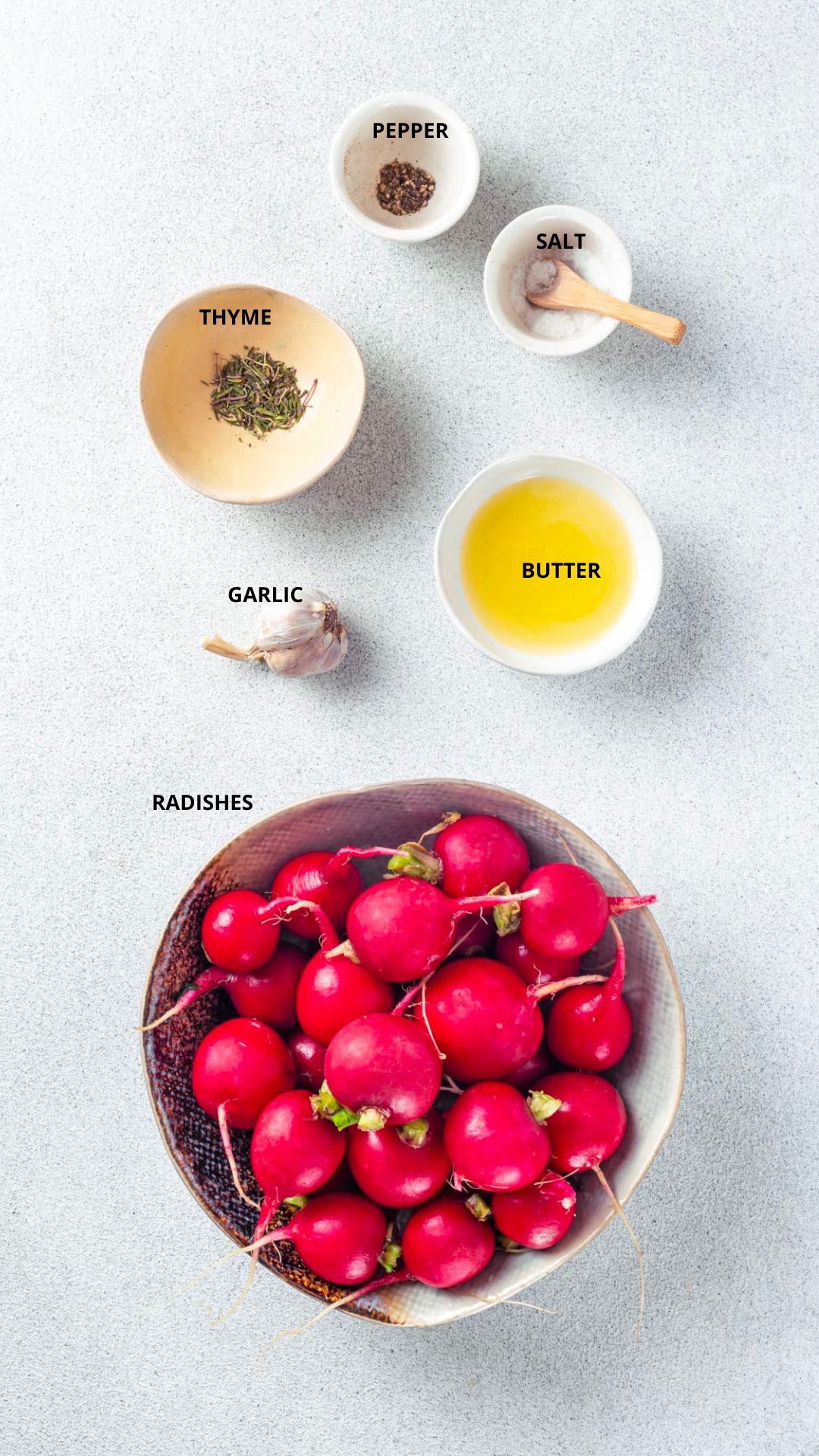 Roasted radishes recipe ingredients pepper, salt, thyme, butter, garlic, and radishes.