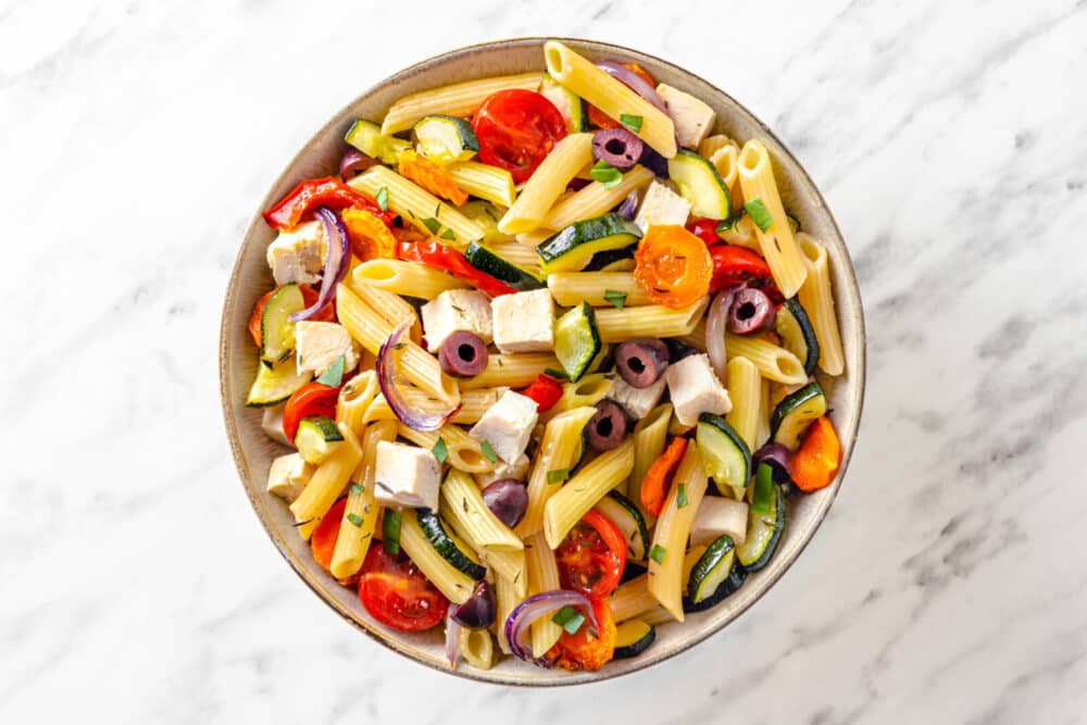 Mixed salad ingredients in a bowl.