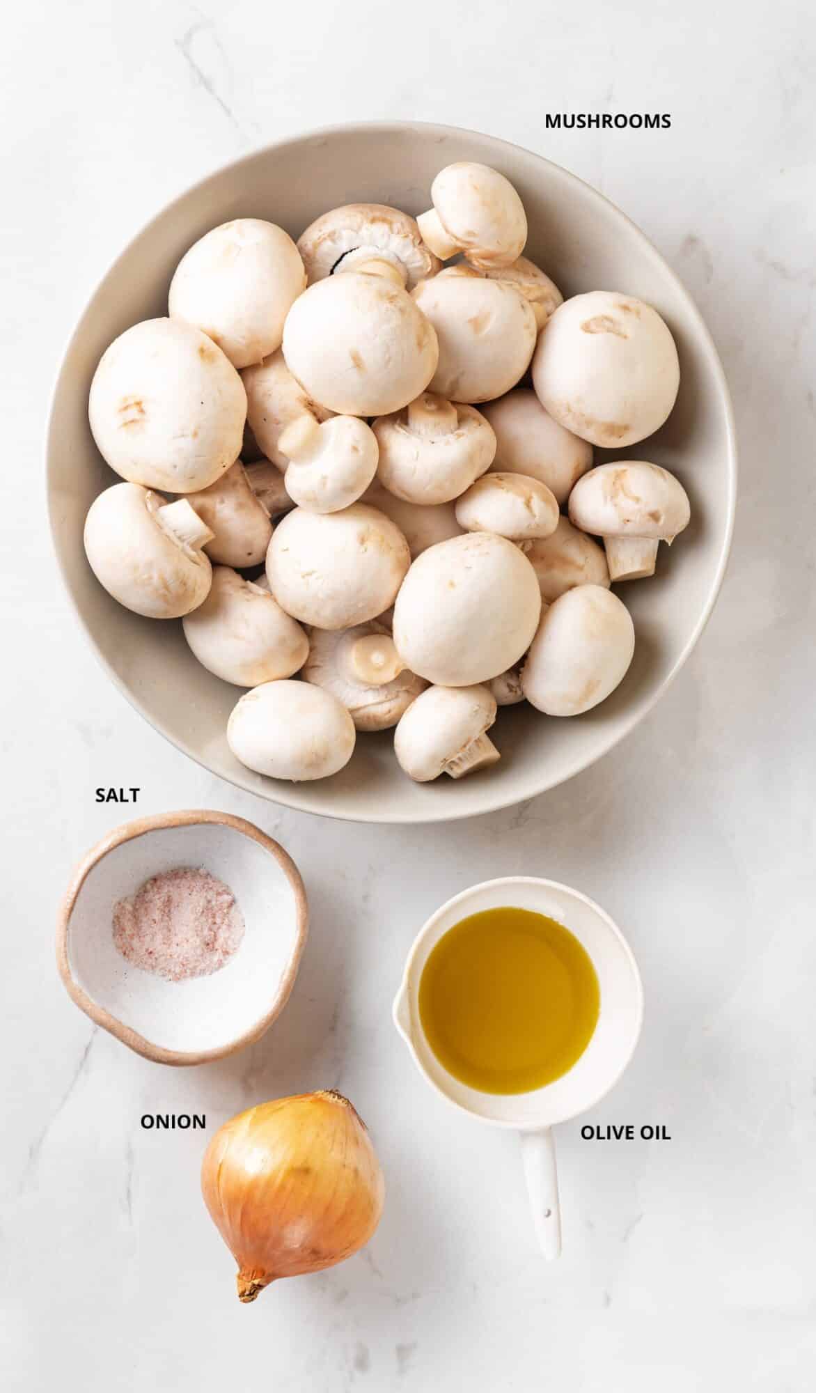 Mushroom side dish ingredients- mushrooms, salt, olive oil, and onion.