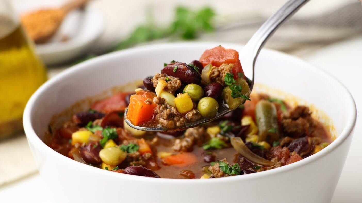 chili-with-taco-seasoning-in-a-white-bowl-and-on-a-spoon