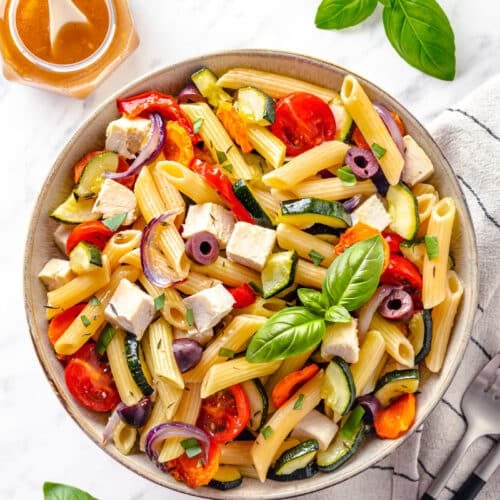 Pasta salad with chicken, olives, and roasted veggies.