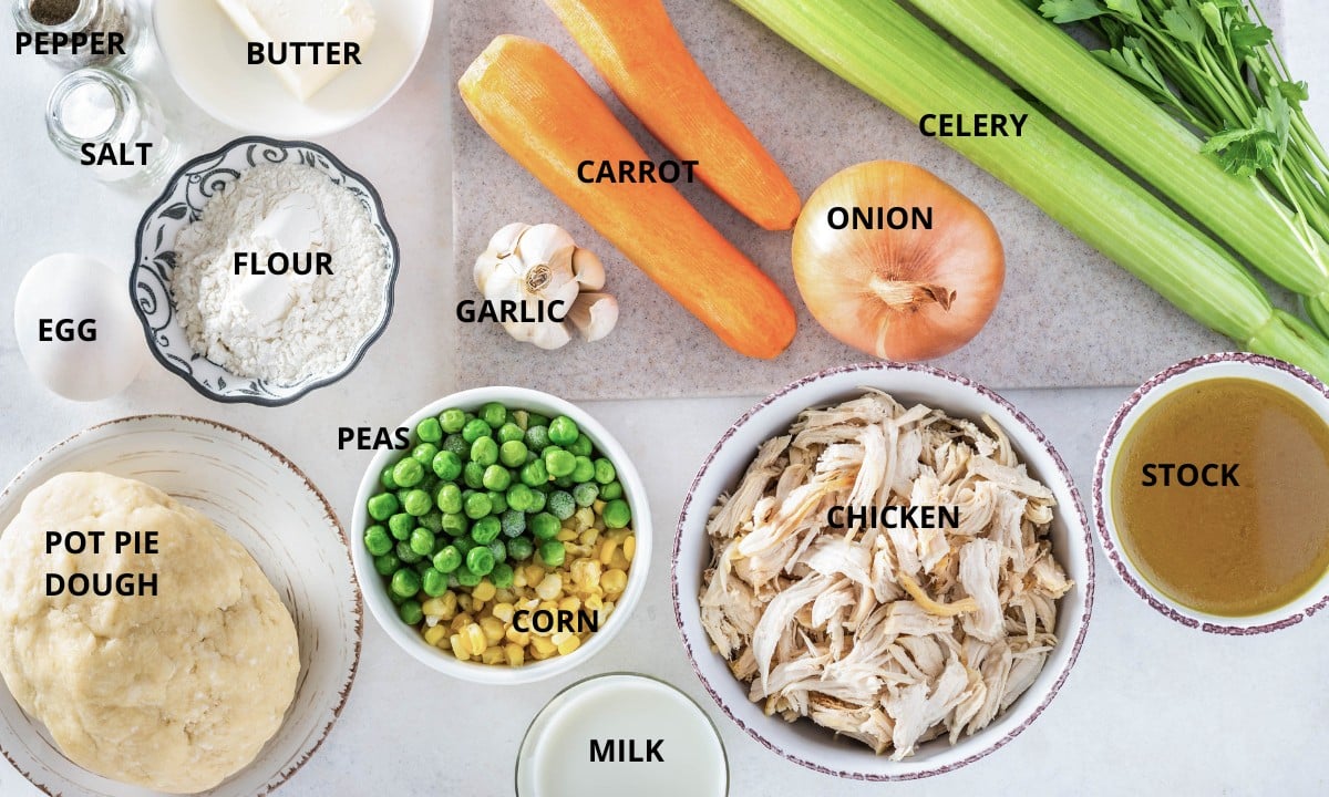 overhead image of chicken pot pie ingredients laid out.