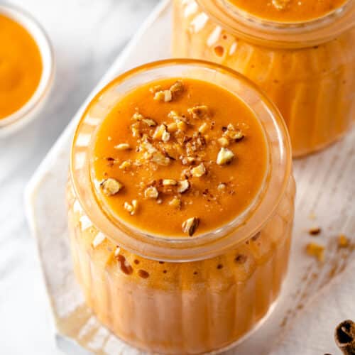 pumpkin pie smoothie drink in a glass cup.