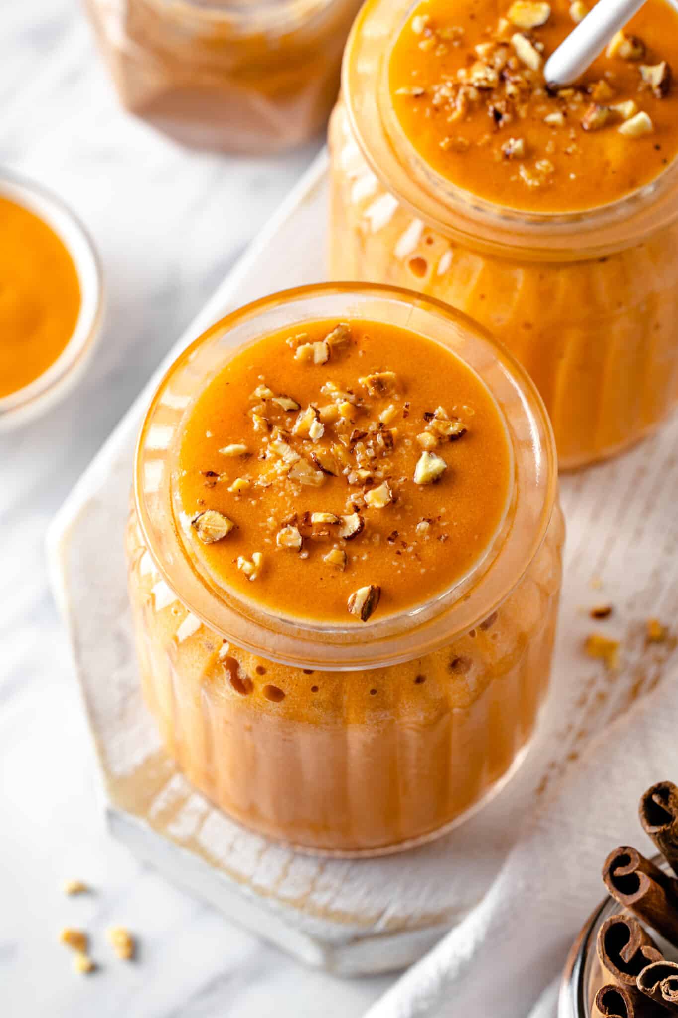 pumpkin pie smoothie drink in a glass cup.