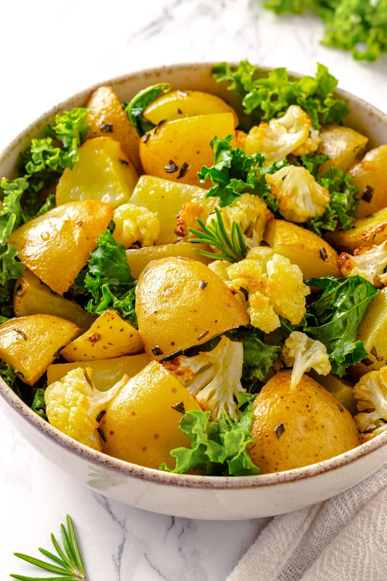 roasted baby potatoes with rosemary, cauliflower and kale.